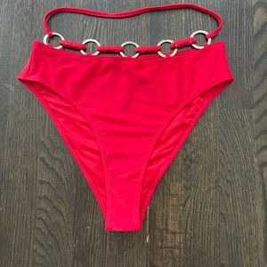 Red high waist rave bottoms with gold ring detail